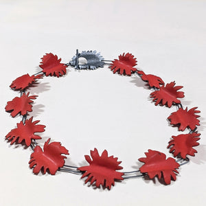 
                
                    Load image into Gallery viewer, abstract red shapes necklace with silver clasp
                
            