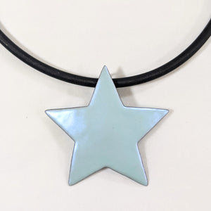 
                
                    Load image into Gallery viewer, pastel blue star pendant close up
                
            
